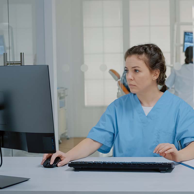 dentist reviewing the practice's new website